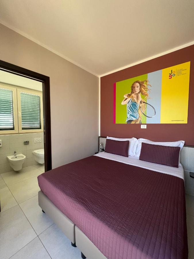 Jogo Rooms Matera Bagian luar foto